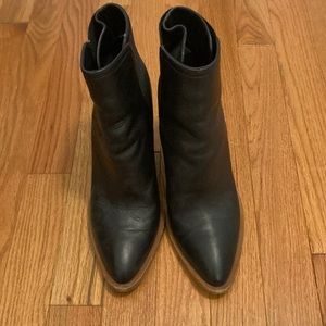 Vince boots only worn a few times. Bottoms are scuffed from city streets